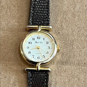 Brand “real nice” Gold and lizard brown band